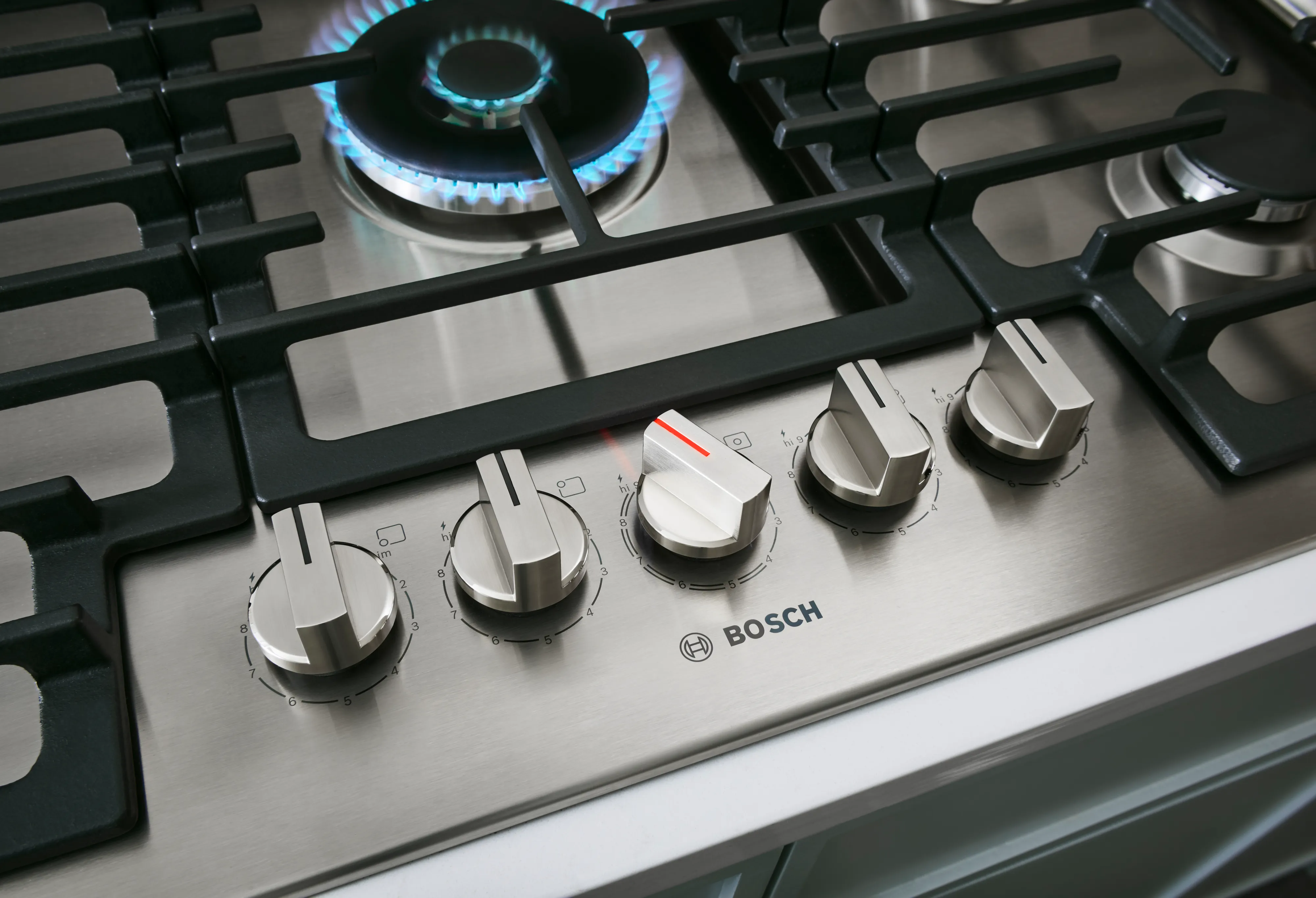 Bosch 36 inch stovetop close up shot of burner and knobs