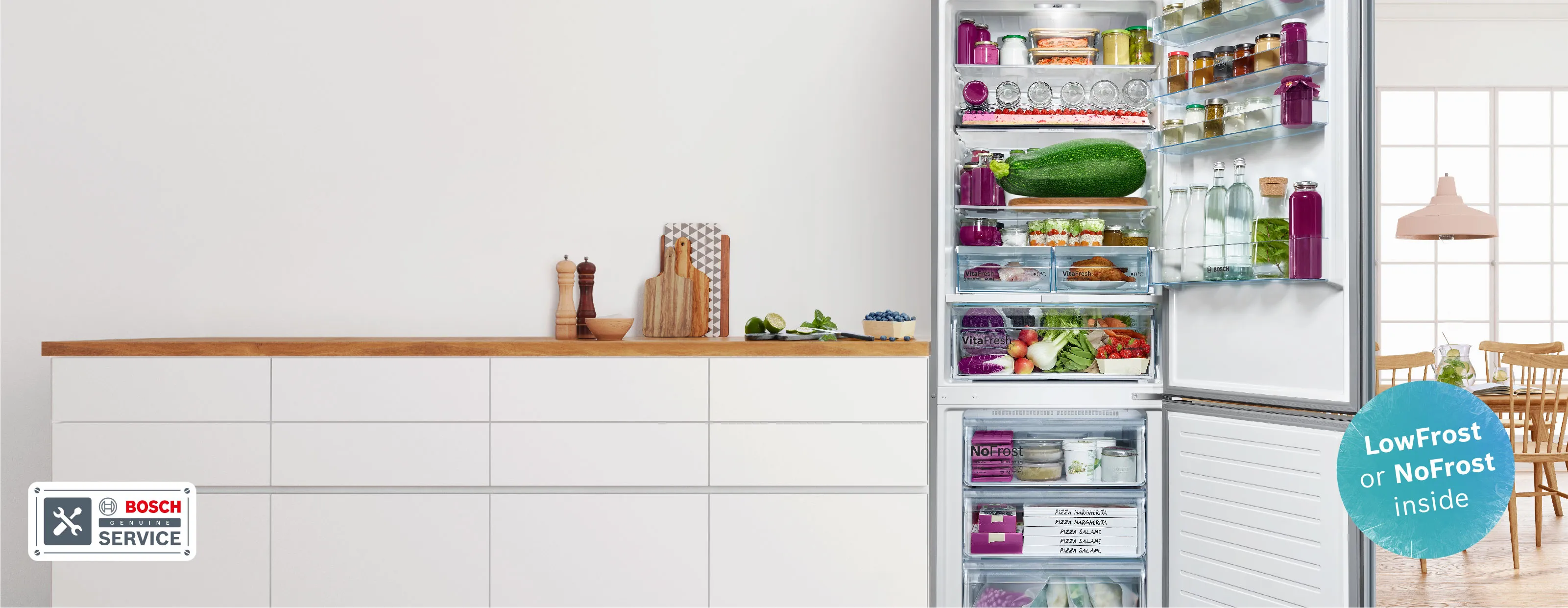 Bosch kitchen with open fridge freezer