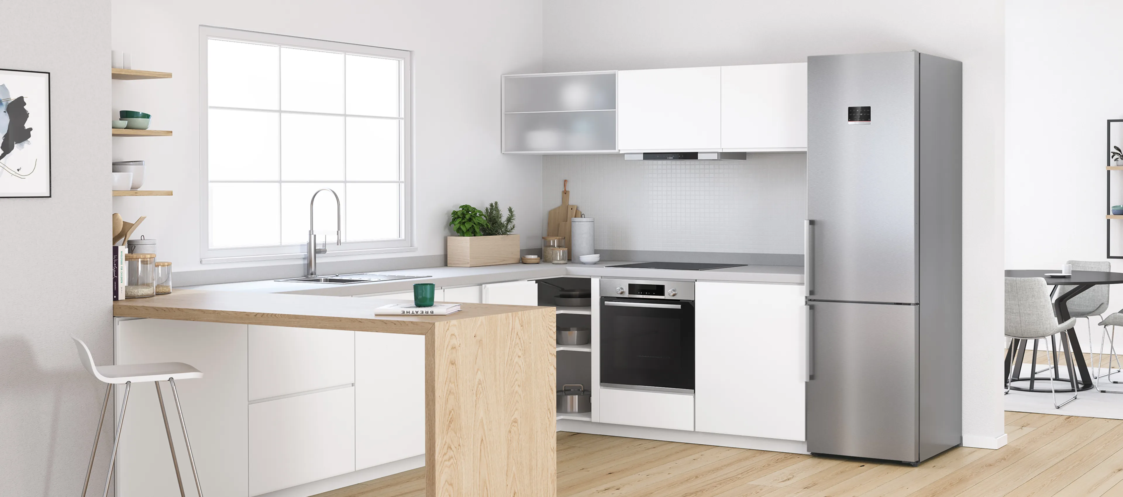 Modern kitchen with a stainless steel fridge, white cabinets, wood countertop, and blue wall decor.