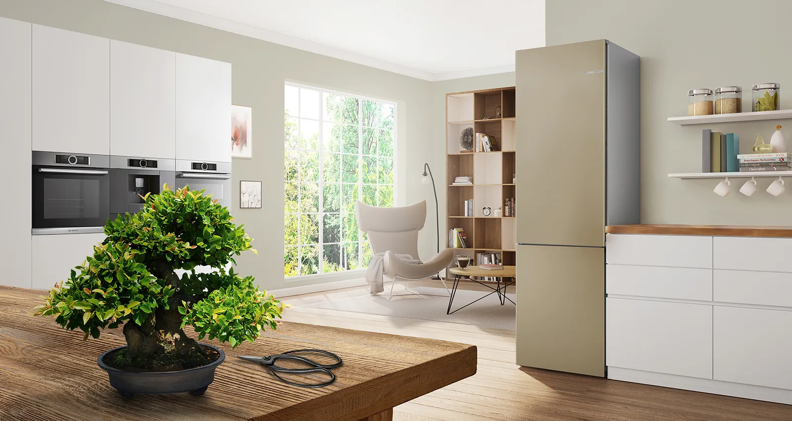 Cuisine moderne avec grande fenêtre, plante en pot, table en bois et appareils intégrés.