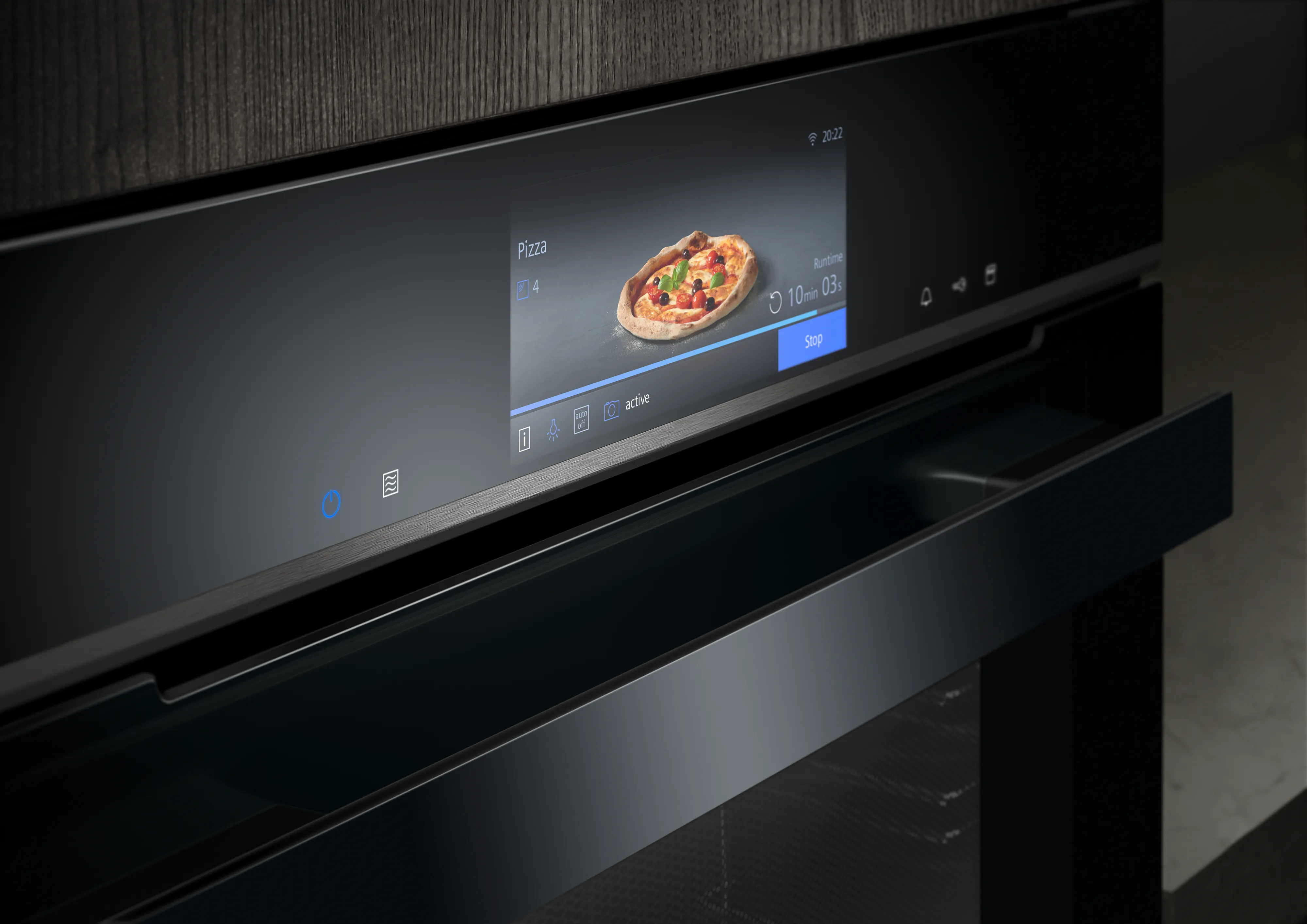 Zwarte ingebouwde Siemens oven met digitaal display met pizzabeeld.