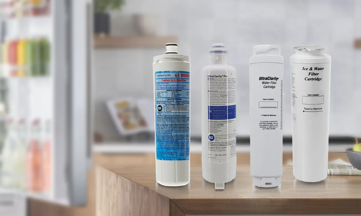 Four Bosch water filter cartridges stand on a wooden countertop in a modern kitchen setting.