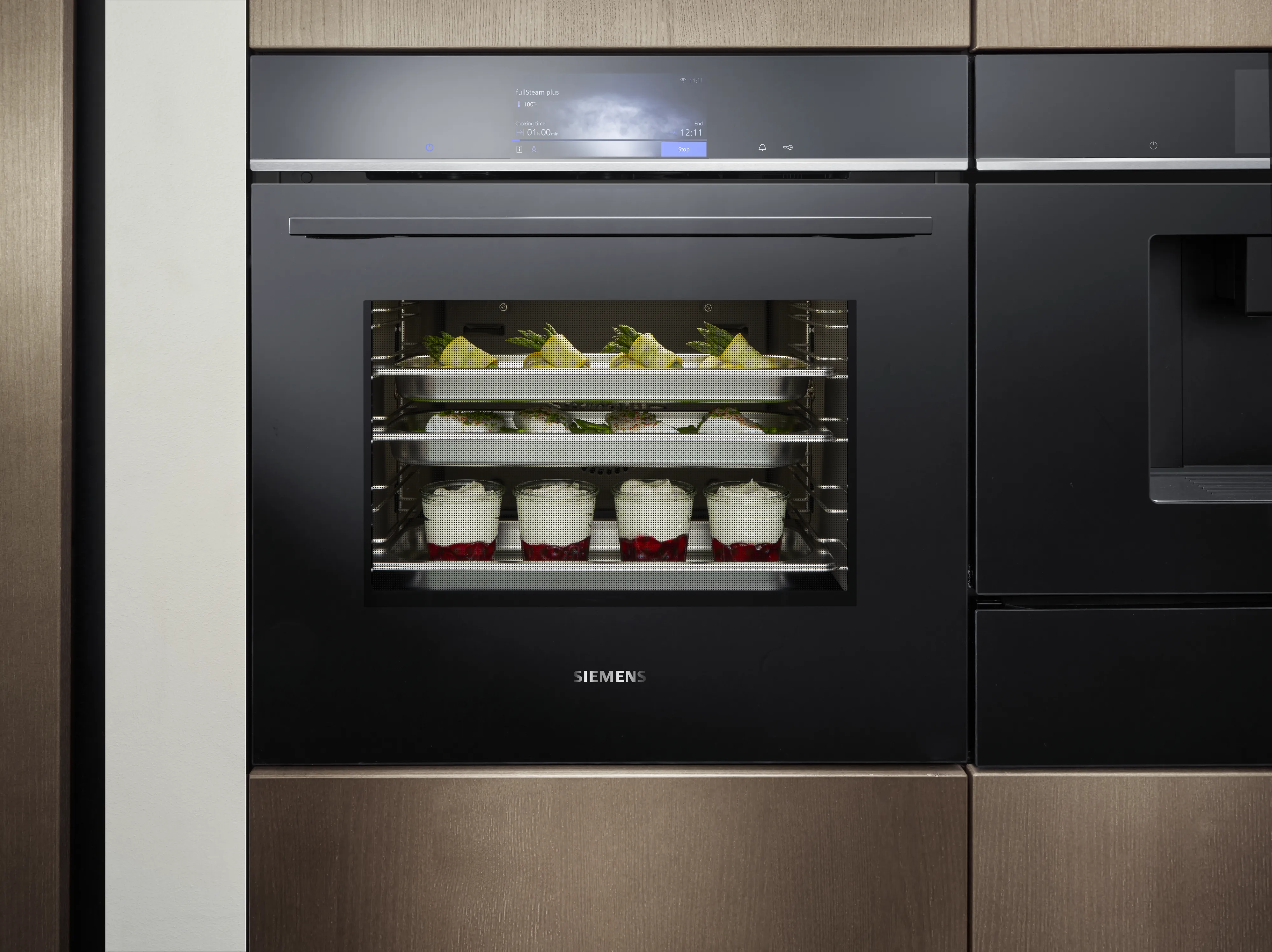 Different food cooking on different oven levels