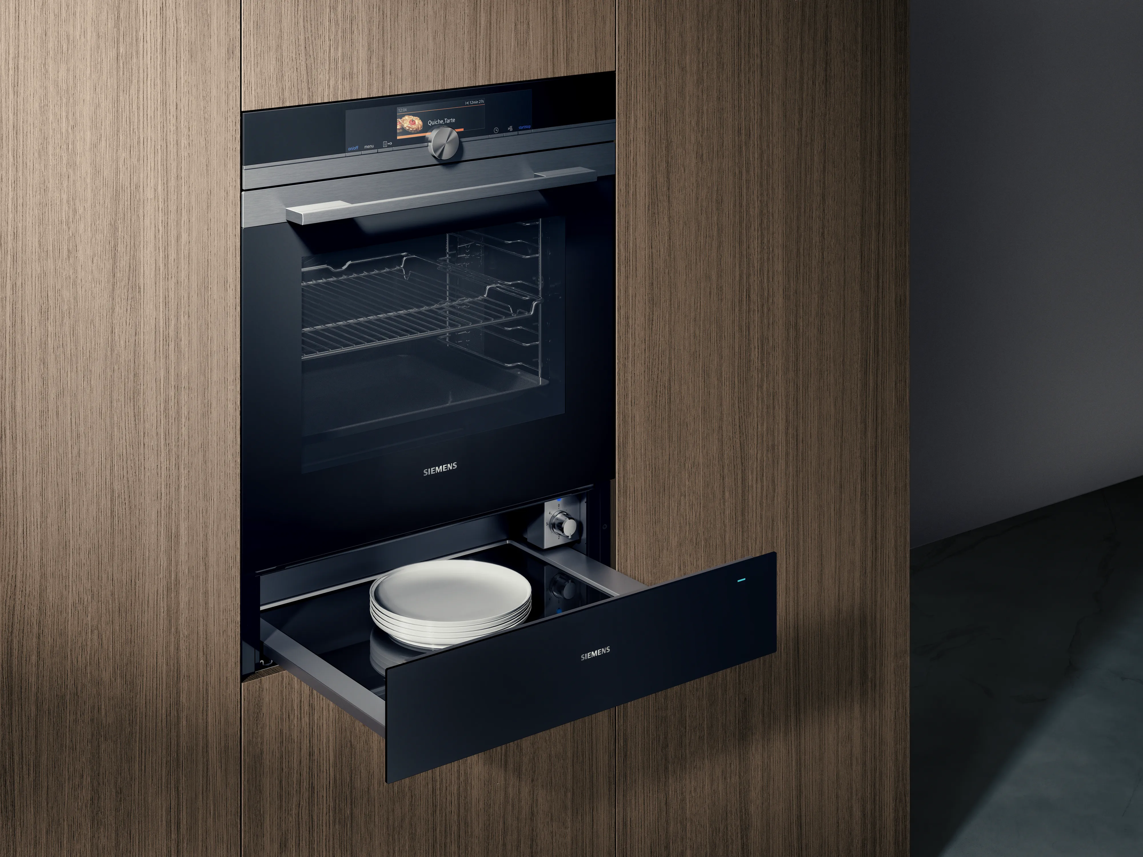 Built-in oven with open drawer, minimalist kitchen design, wood and black color scheme.