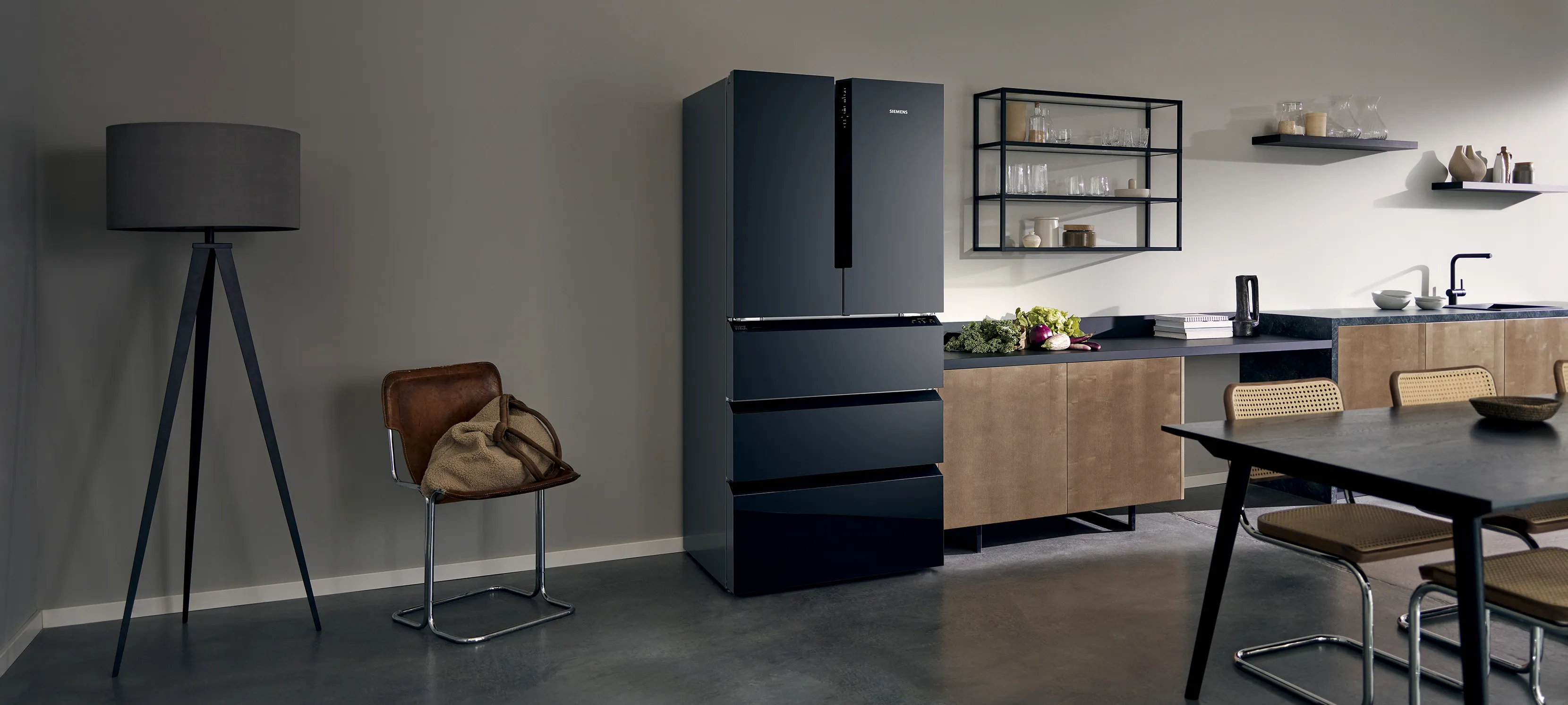 Dark fridge freezer in kitchen setting