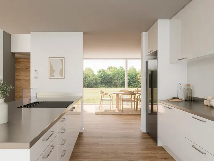 Luminosa cocina de diseño en isla, en colores claros, conectada con un porche y un jardín, equipada con electrodomésticos Siemens