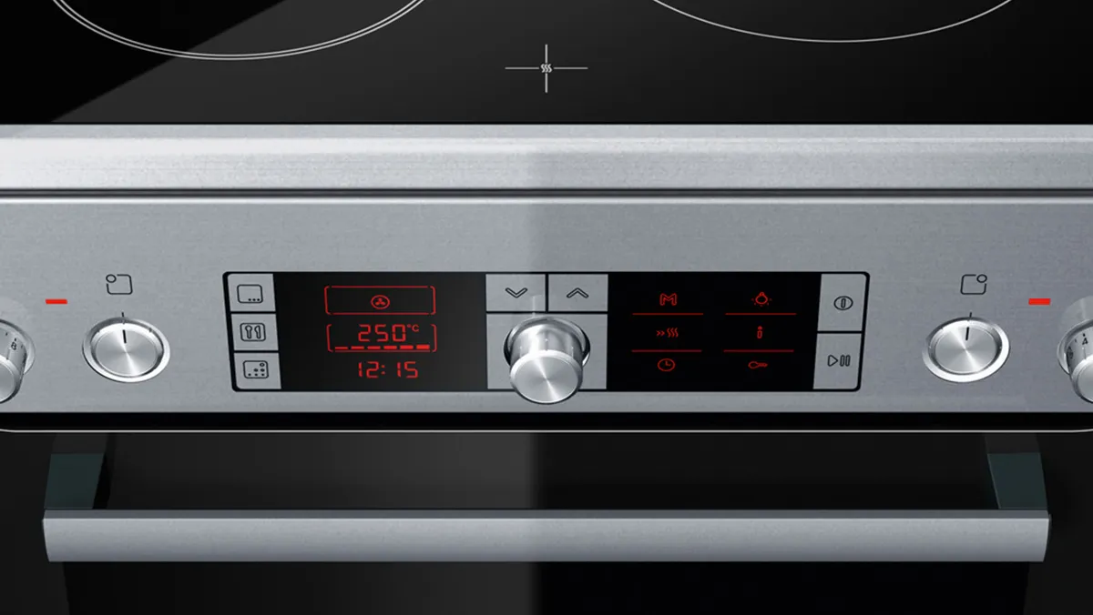 Close-up of Bosch freestanding cooker control panel with digital display, highlighting the variety of heating modes.