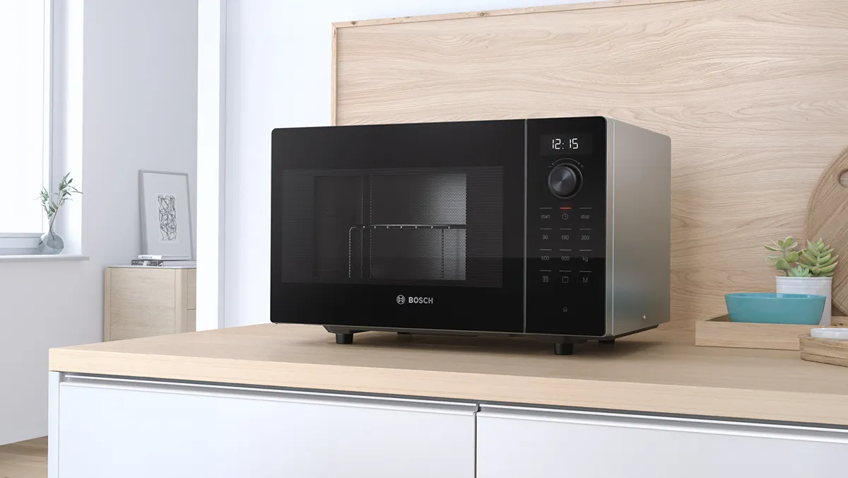 Modern Bosch freestanding black microwave, offering various dimensions and capacities to suit your space and cooking needs.