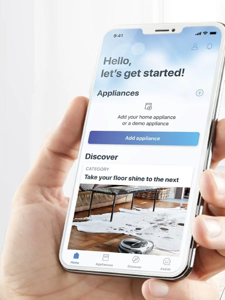 someone holding a phone with the Home Connect app open