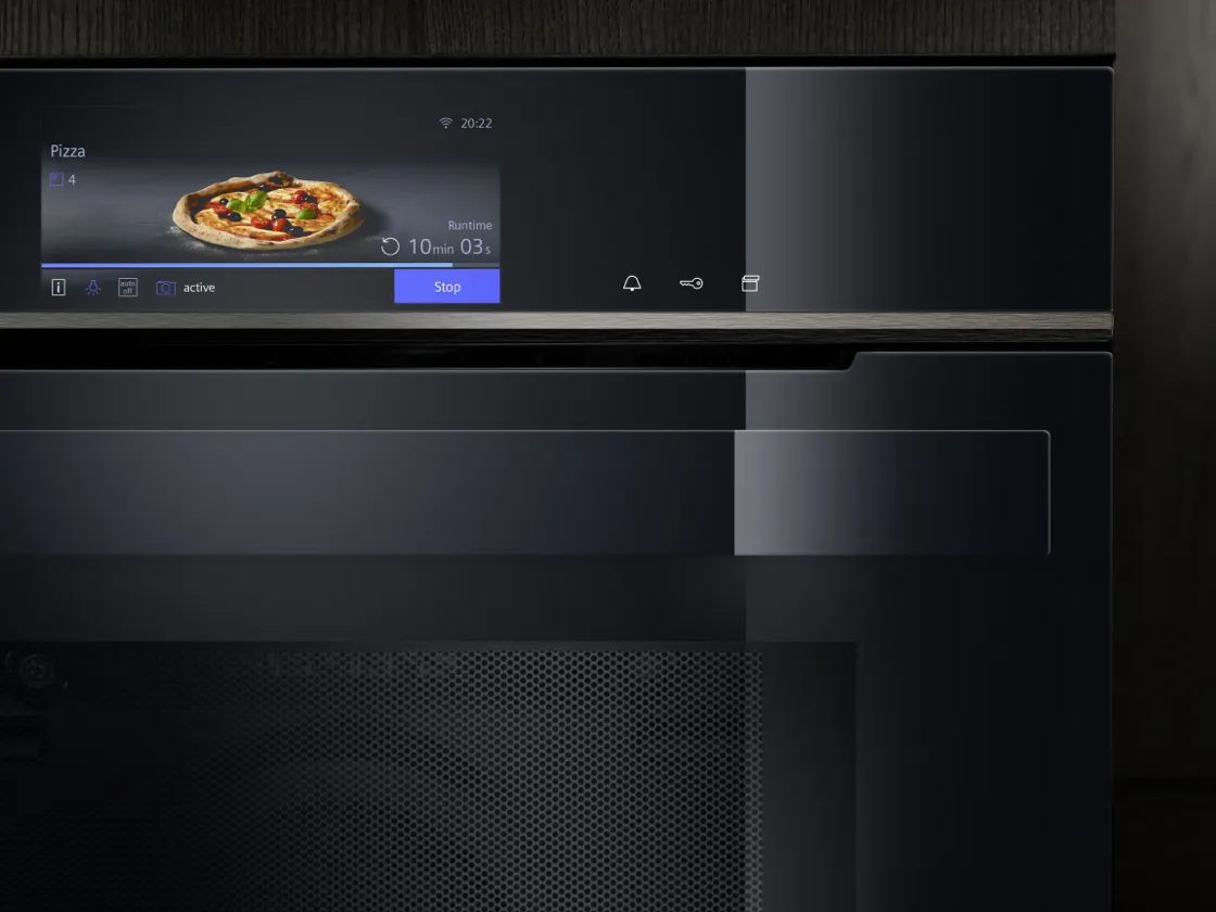 Oven display showing a pizza image, with various cooking settings and controls.