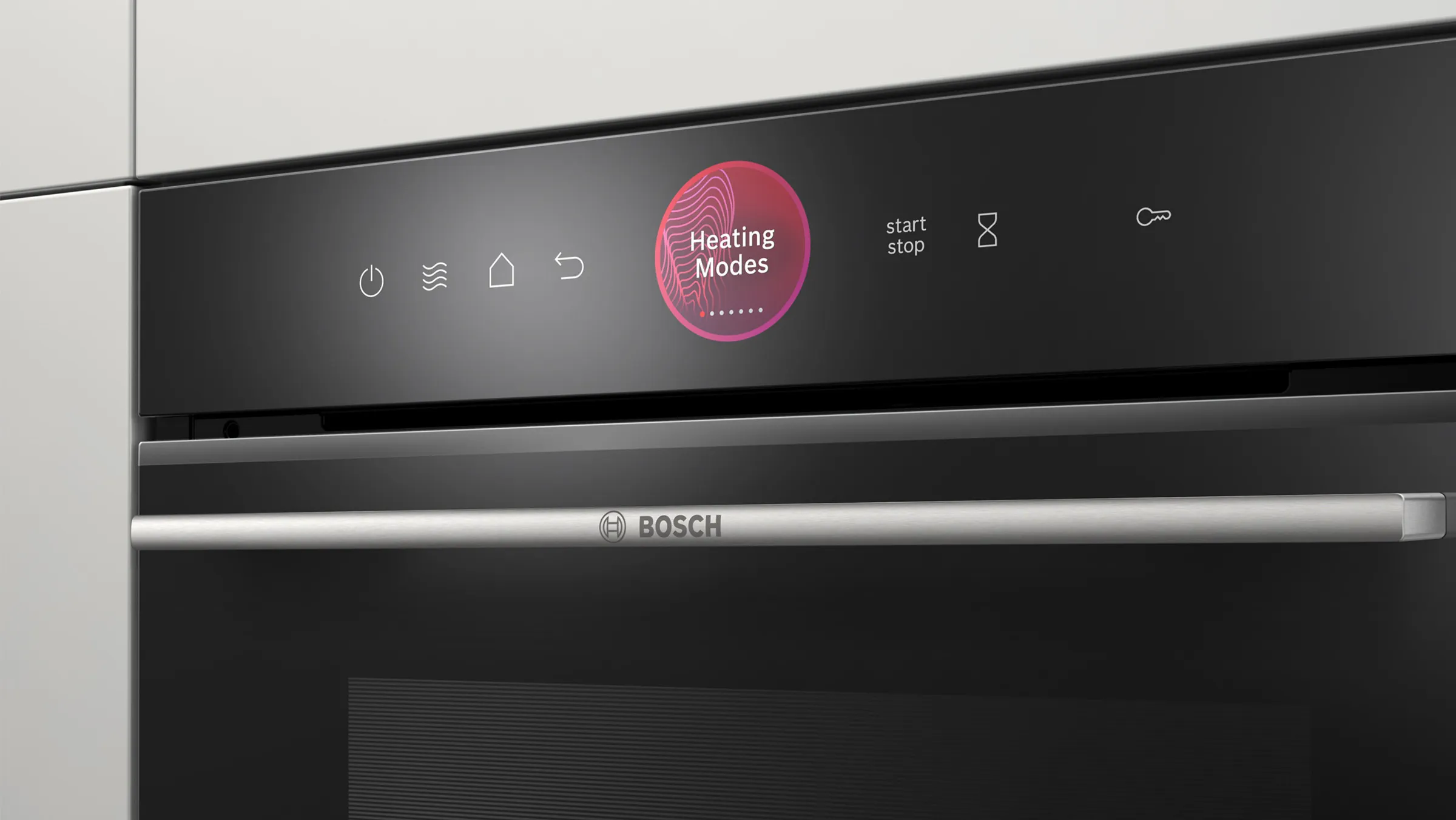 Nahaufnahme des schwarzen Bedienfelds eines Bosch Einbau-Backofens mit eingeschaltetem, runden TFT-Touchdisplay und leuchtenden Touch-Symbolen.