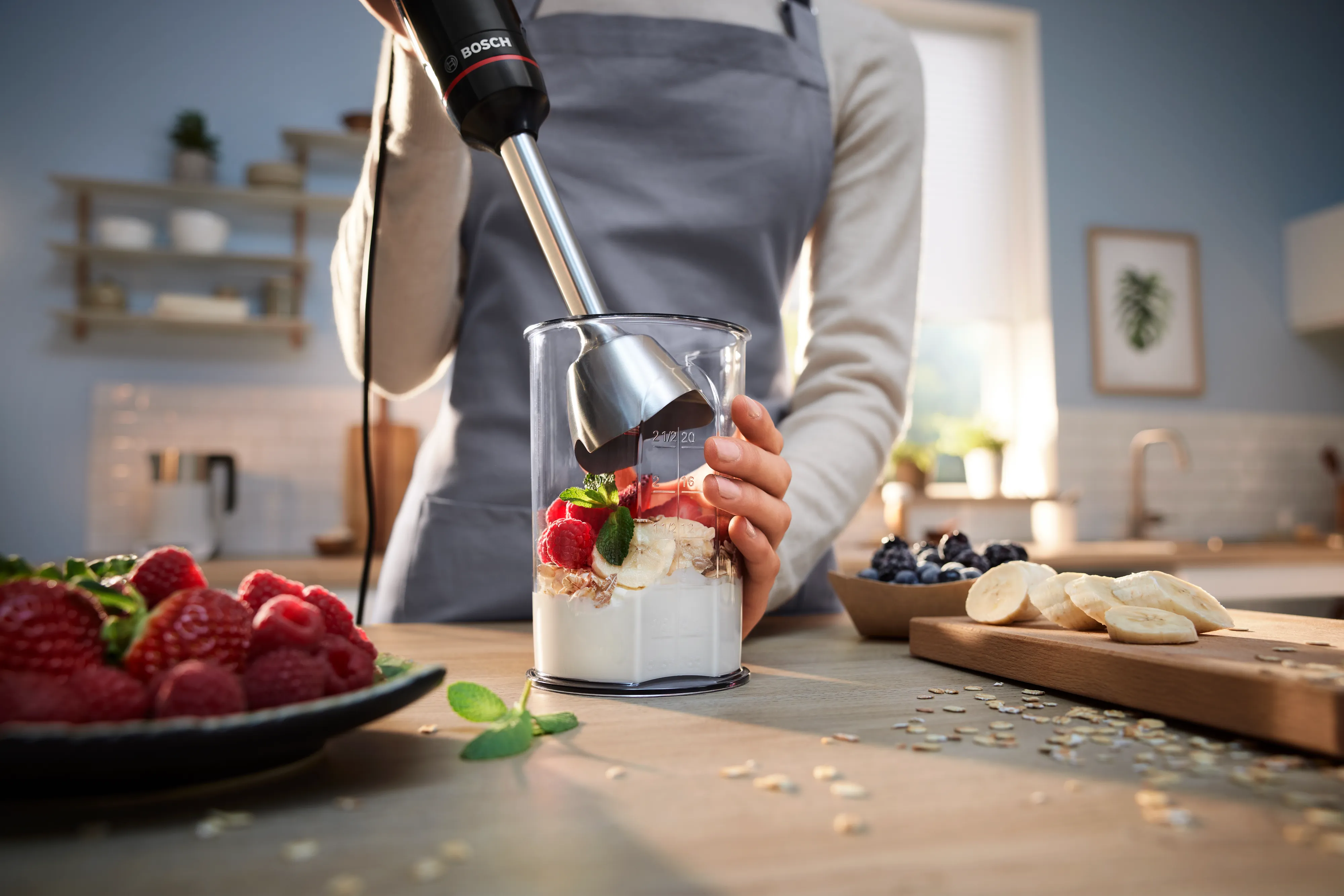 The ErgoMaster hand blender set with the maximum number of attachments on a kitchen worktop.