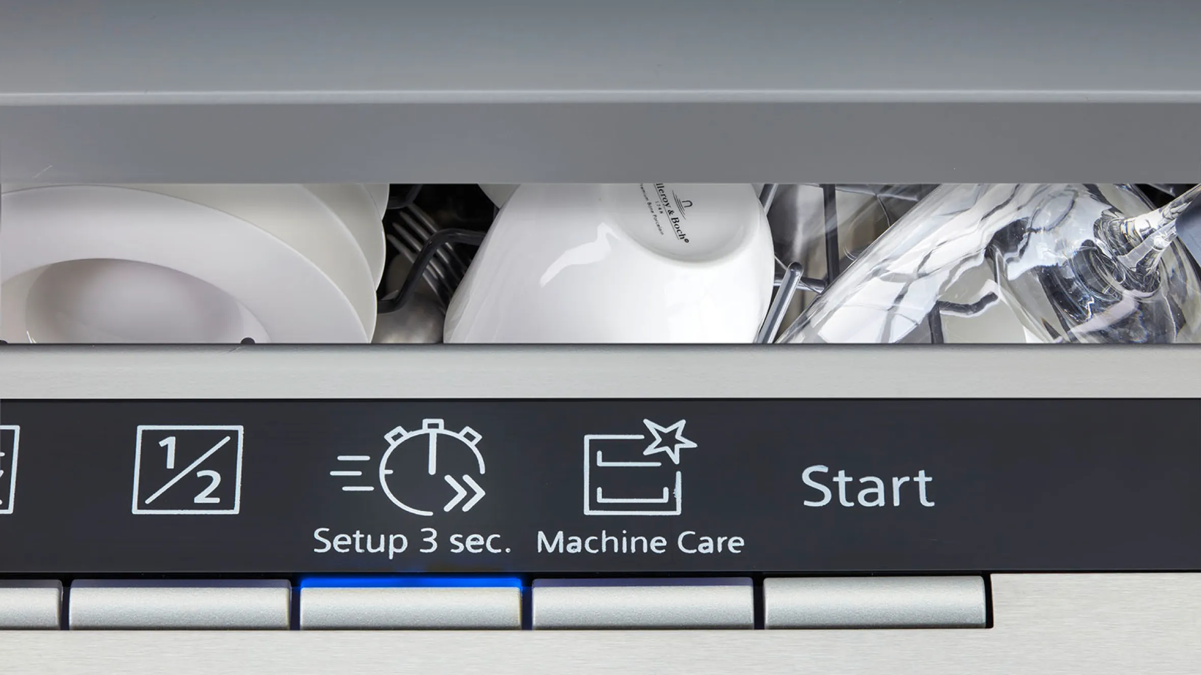Washing machine control panel with icons and text instructions for setup, machine care, and start.