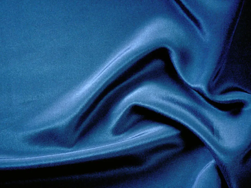 Flowing, abstract, blue, wavy, textured, dynamic, smooth, elegant, artistic.