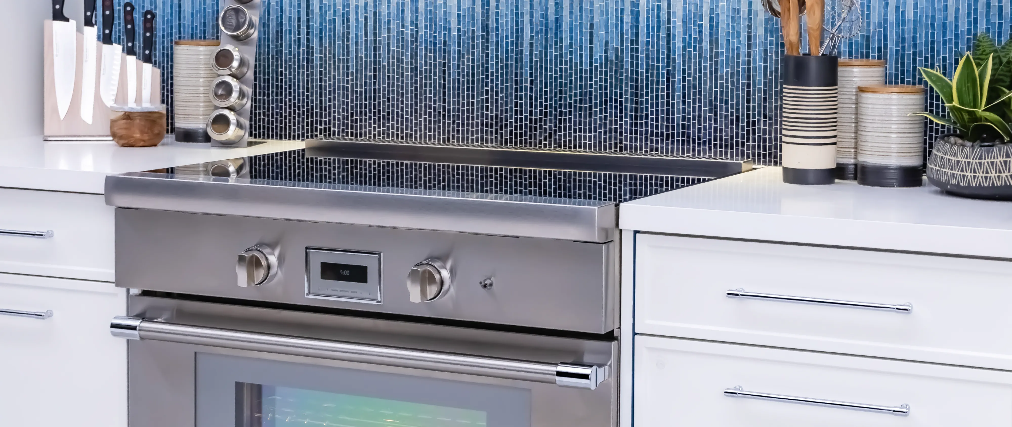 thermador-36-inch-slide-in-ranges-front-shot-with-yellow-dutch-oven-and-rack-of-lamb