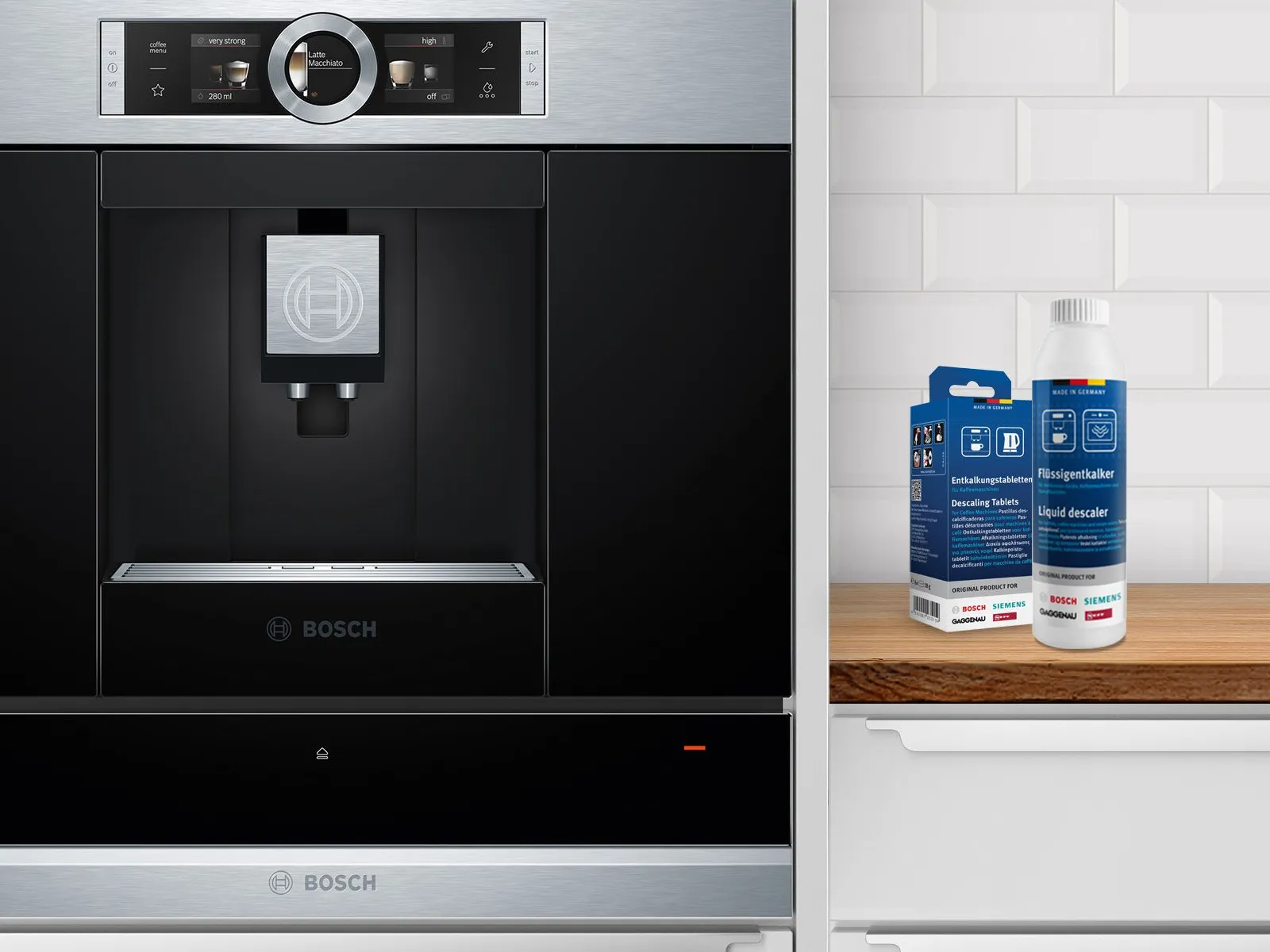 Integrated Bosch coffee machine with descaling products on the kitchen counter