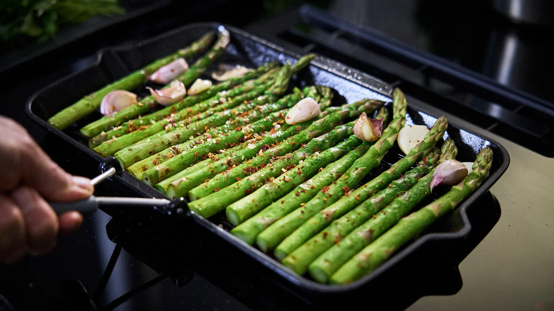asparagus and garlic on tray