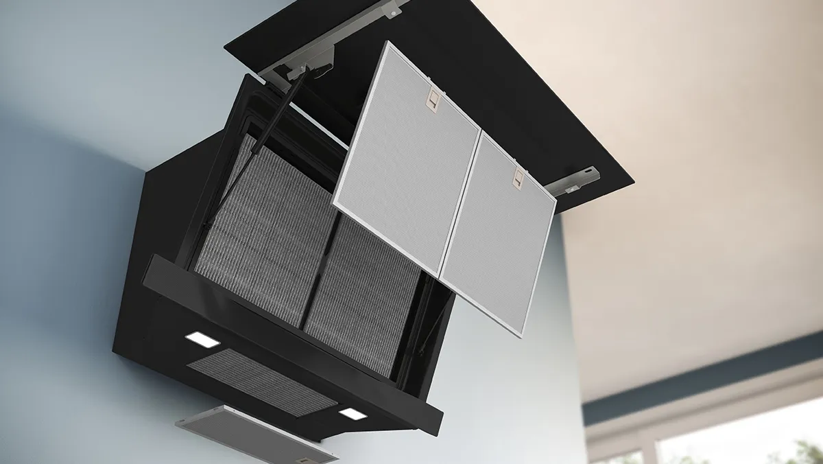 Modern black and white ceiling light fixture with geometric shapes.
