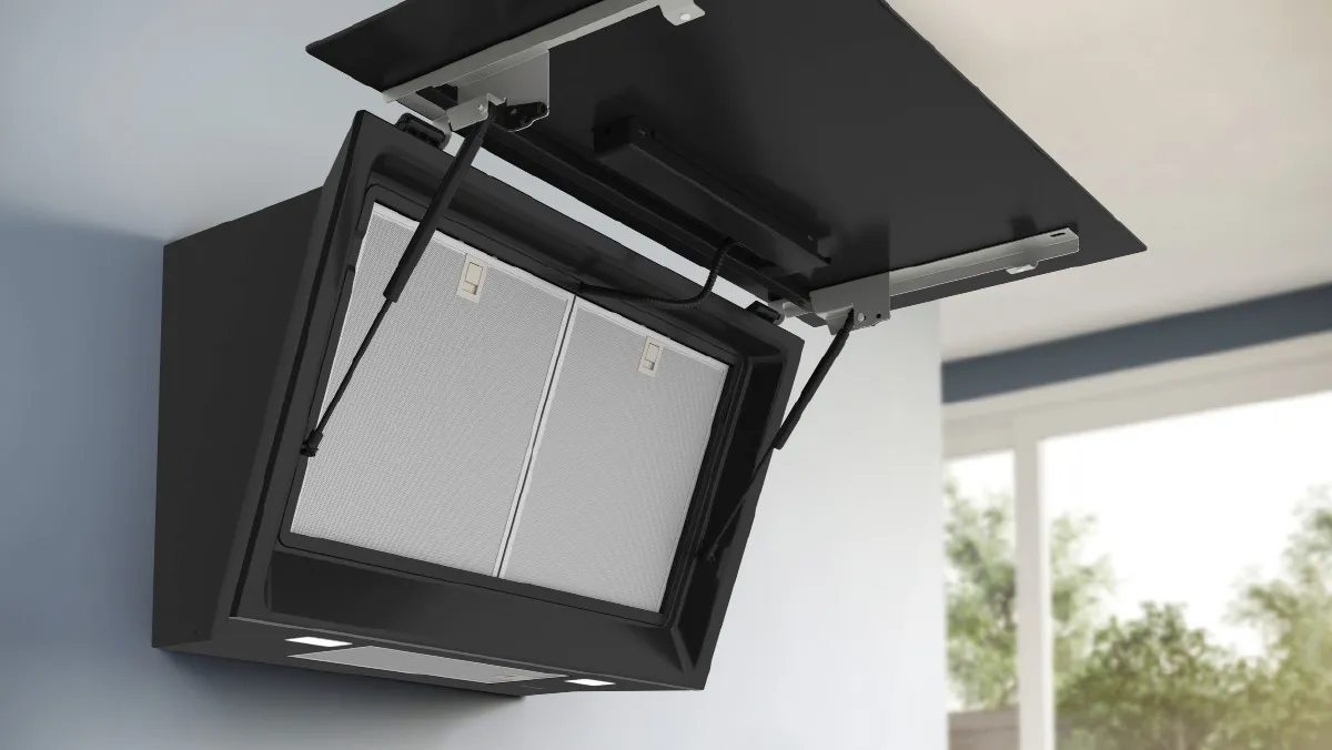 Ceiling-mounted black media cabinet with adjustable shelves and lighting.