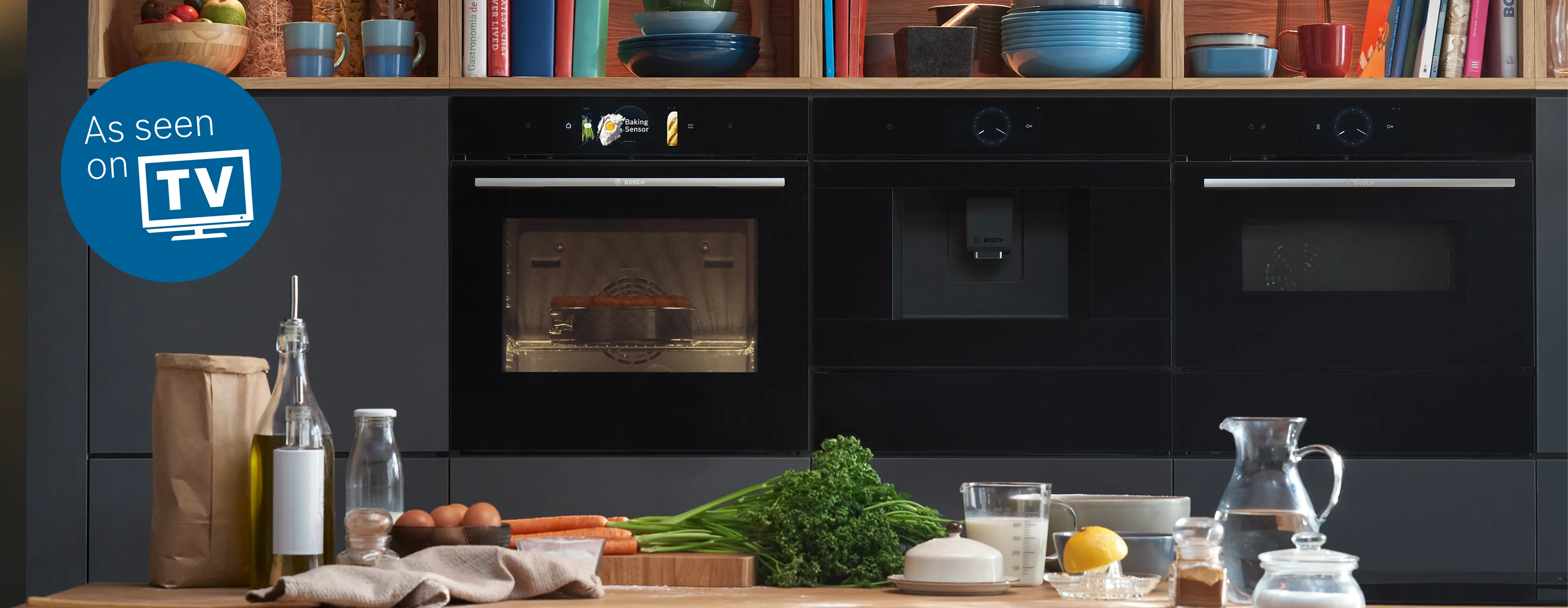 An oven and microwave in a modern living environment.