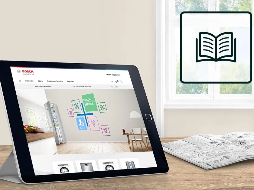 Tablet displaying Electrodomésticos Bosch, icono de libro en la ventana, planos arquitectónicos en escritorio.