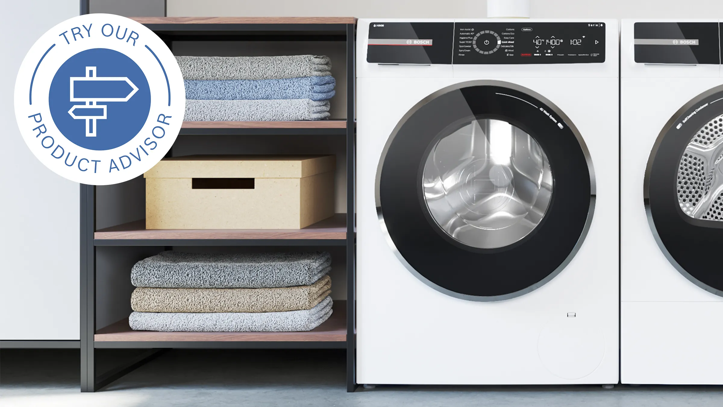Laundry room with washing machine, dryer, and shelves with folded towels and boxes.