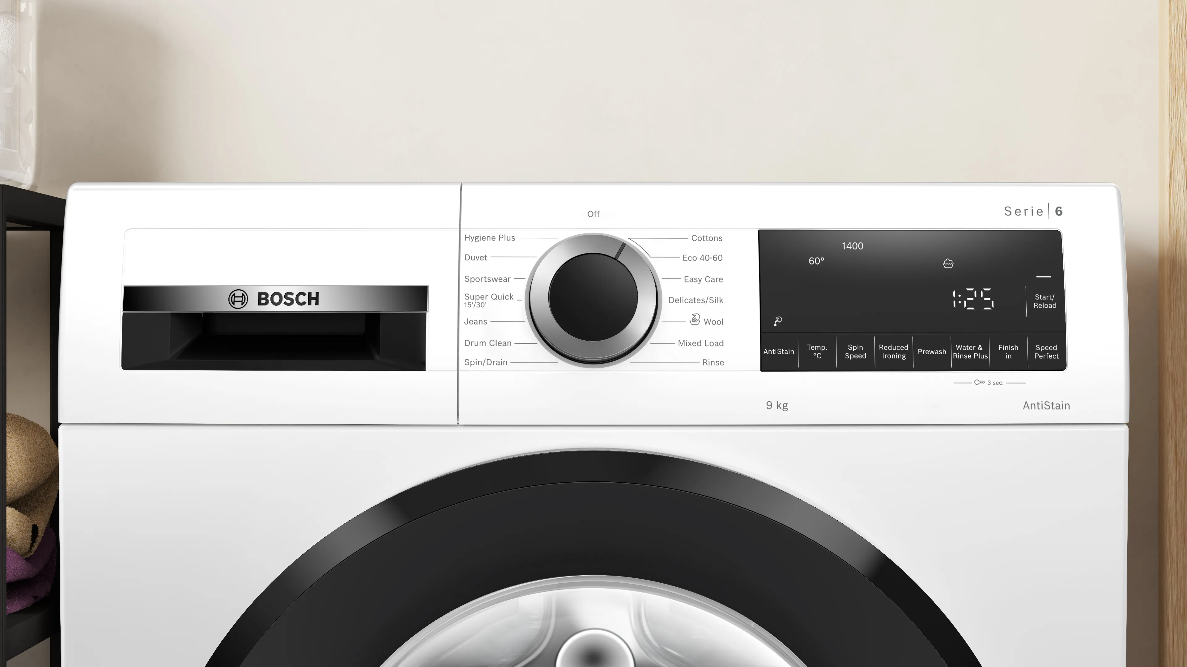 Bosch washing machine with control panel, timer, and various settings displayed.