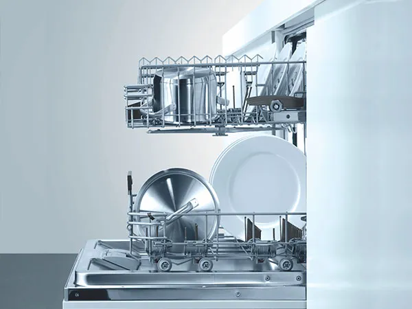 Sunlight filtering through lush green trees, symbolising Bosch's commitment to sustainability and environmental health.