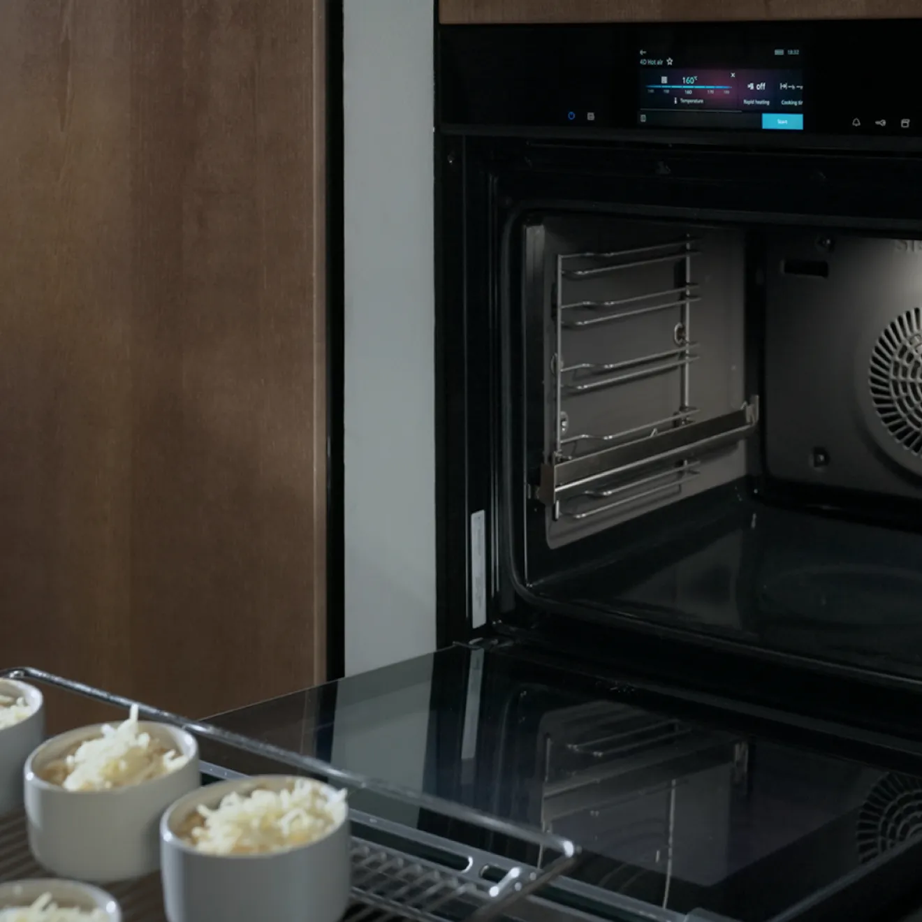 Oven interior with baking dishes, kitchen appliance, cooking, food preparation.