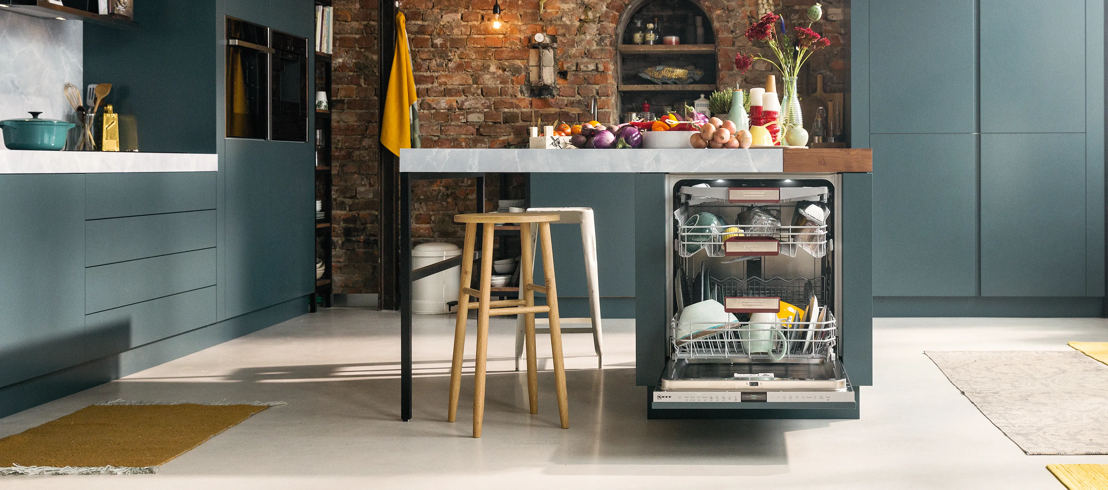 A light-brown kitchen unit with a semi-integrated dishwasher underneath the countertop
