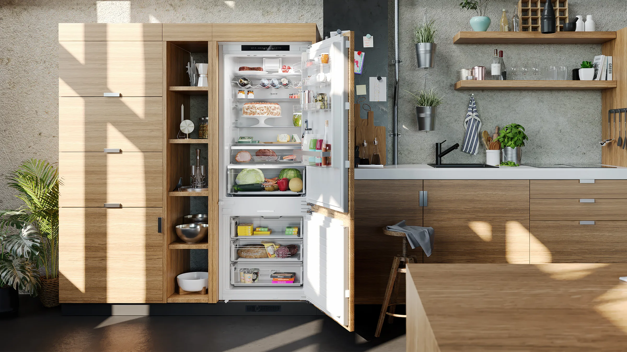 An open built-in fridge freezer inside a light-wood kitchen illuminated by daylight.