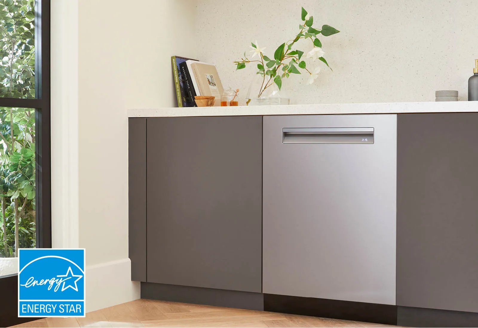 Modern kitchen with an Energy Star Bosch stainless steel dishwasher integrated into cabinets.
