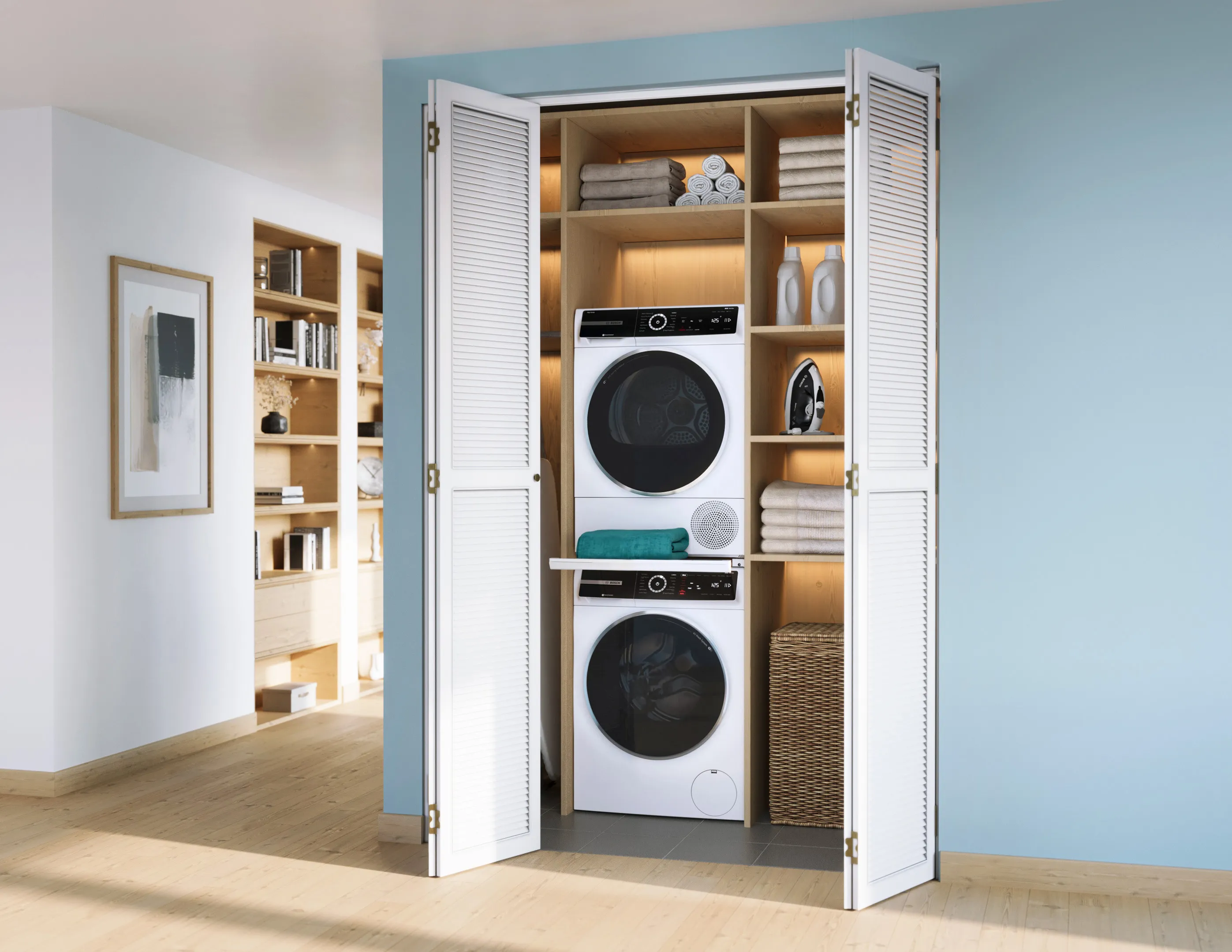 Stacked washer and dryer set in a closet with shelves, featuring household items and decor.