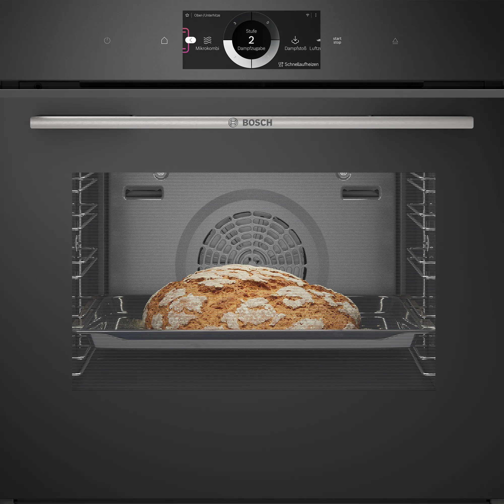 Forno Bosch con display digitale che indica il livello di vapore 2, mentre cuoce una pagnotta rotonda dalla crosta croccante su una teglia.