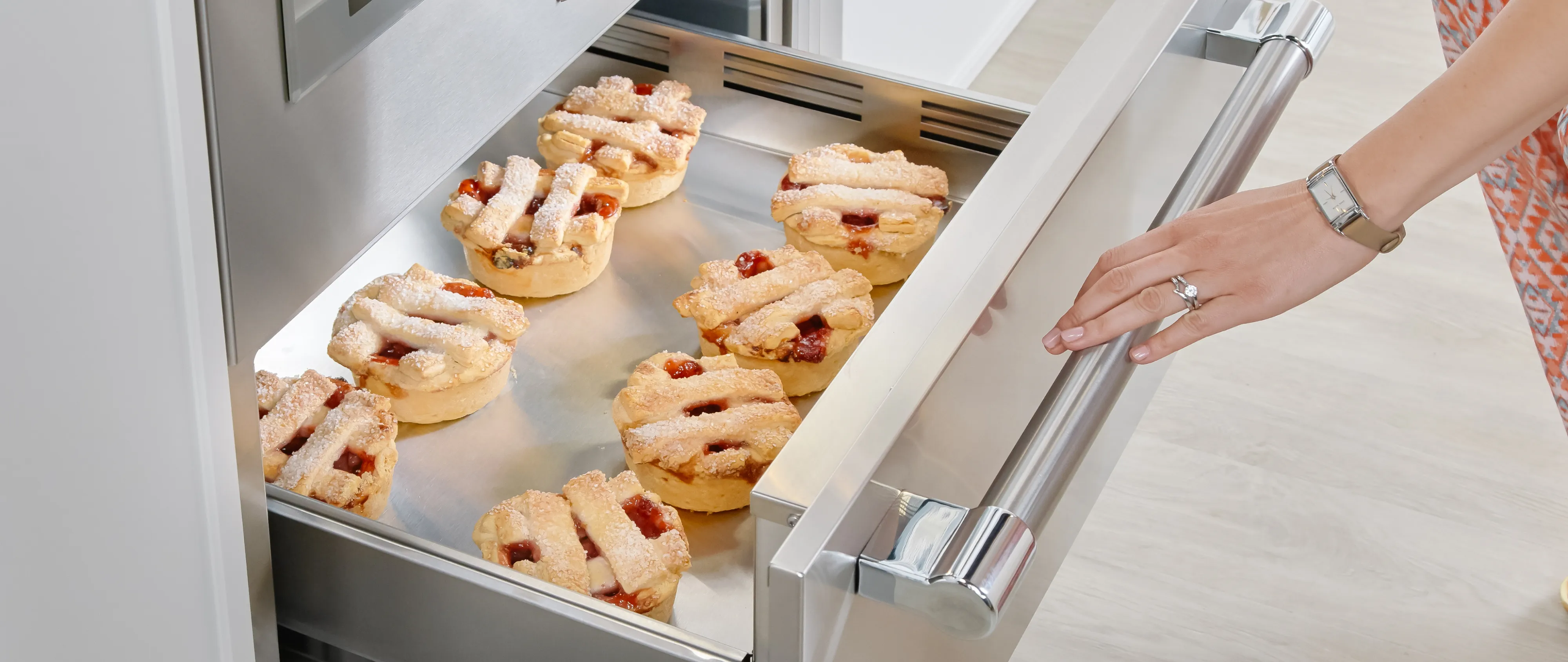Thermador oven warming drawer with pastries inside