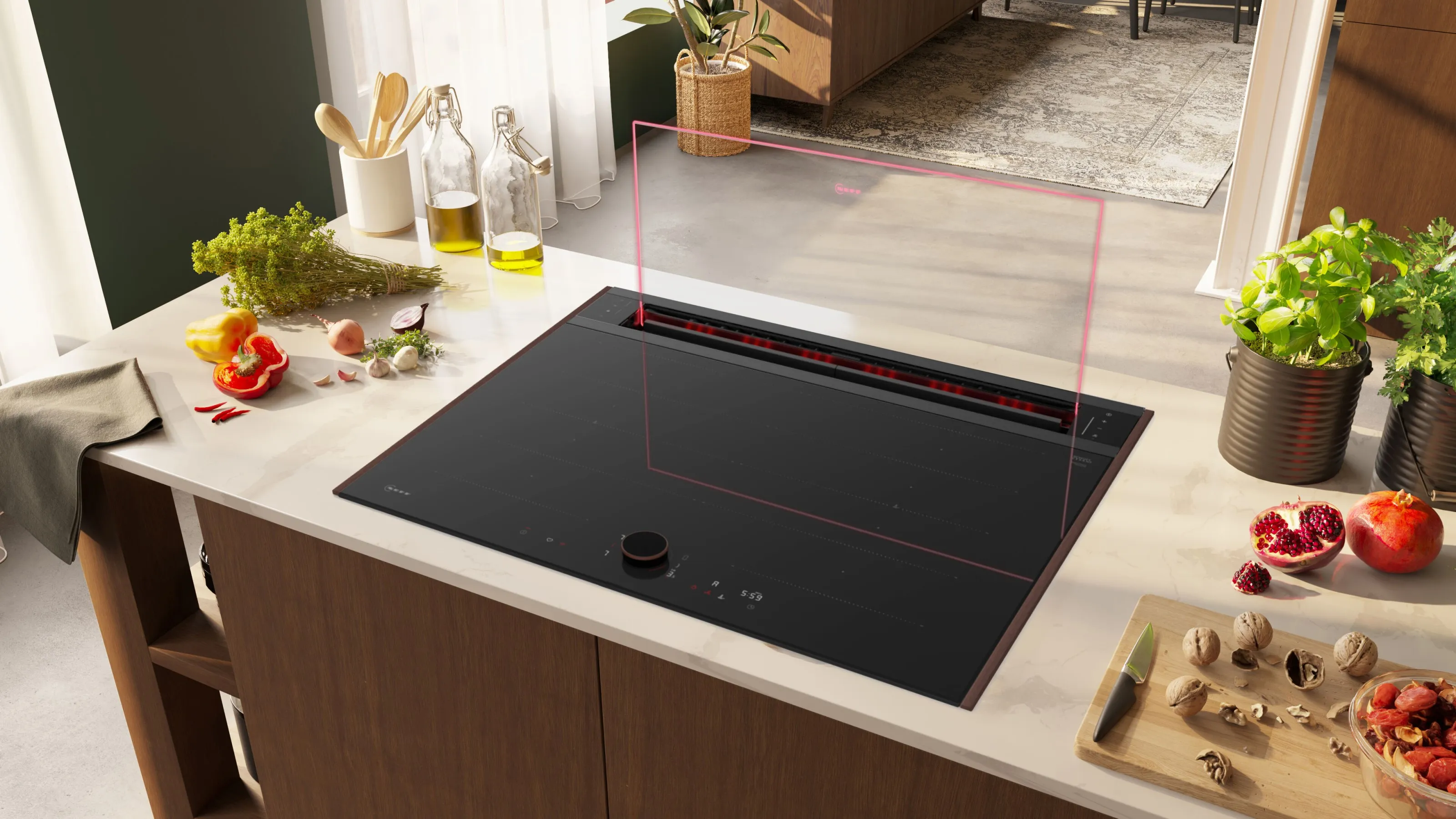 NEFF kookplaat met glazen afzuigsysteem geïntegreerd in een aanrecht met een rood lichtframe