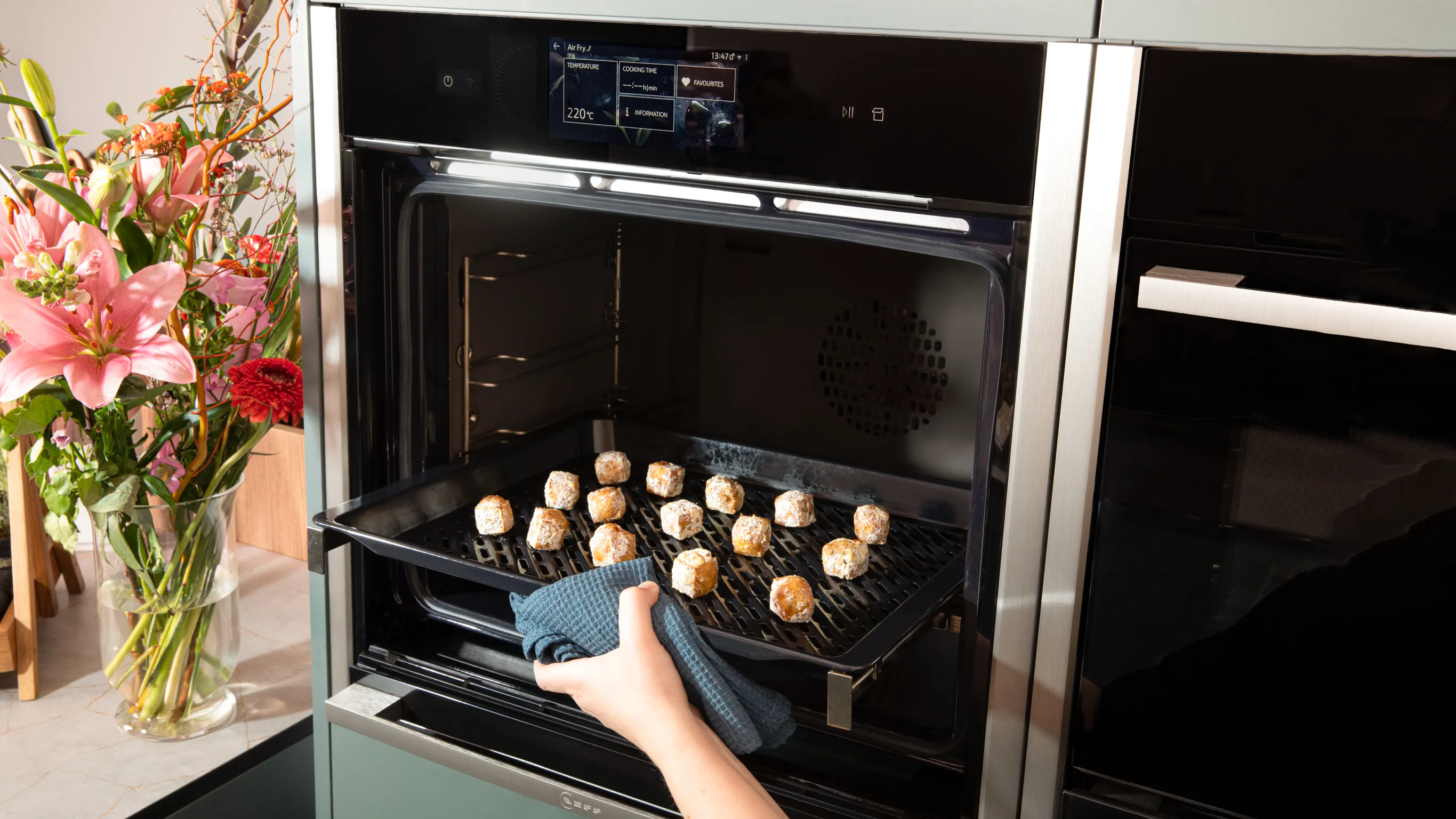 Placing the tofu on an Air Fry & Grill Tray in the oven