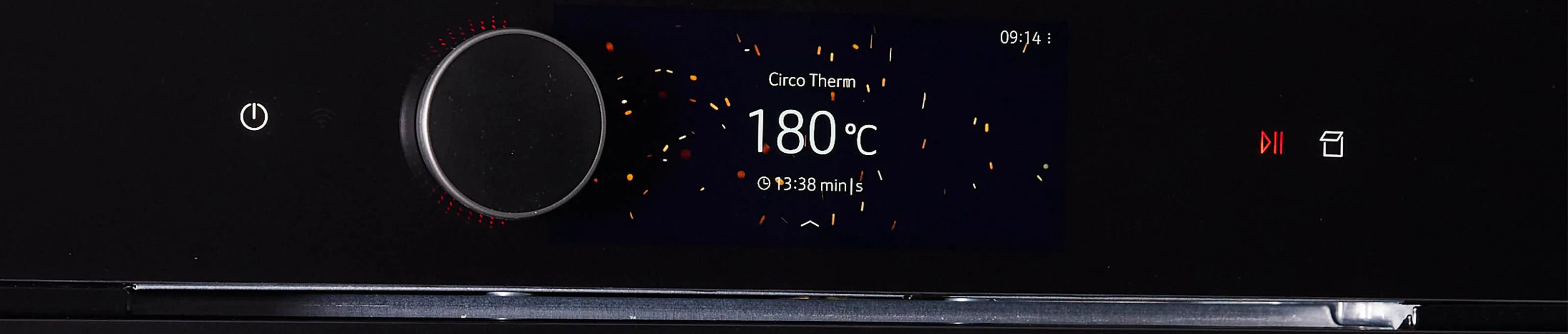Digital display showing temperature, time, and other information on a dark background.