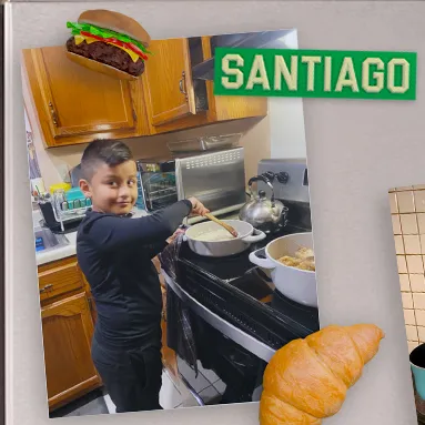 Child cooking on a stove in a kitchen, with food clip art and the name 'Santiago'.