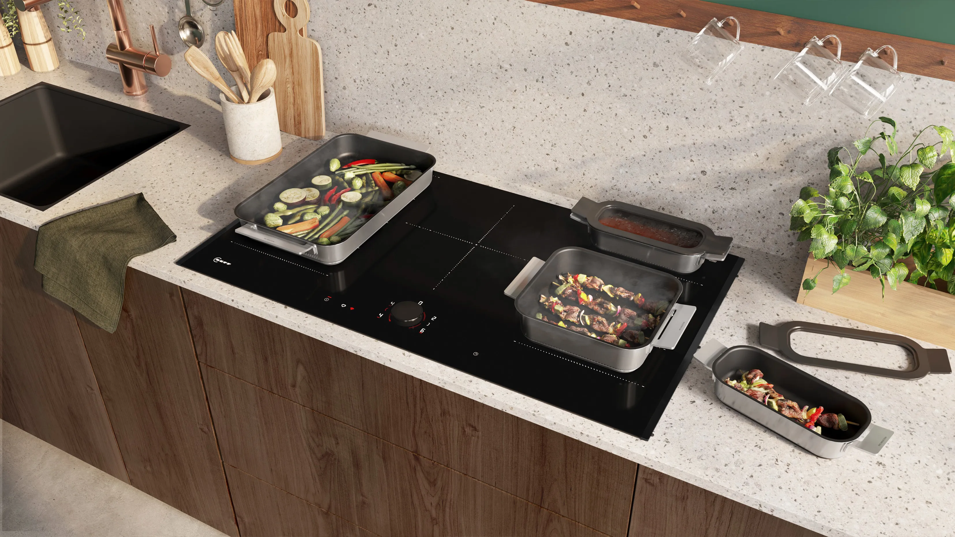 Keukentafel met kooktoestellen, keukengerei en planten - modern, georganiseerd en functioneel ontwerp.