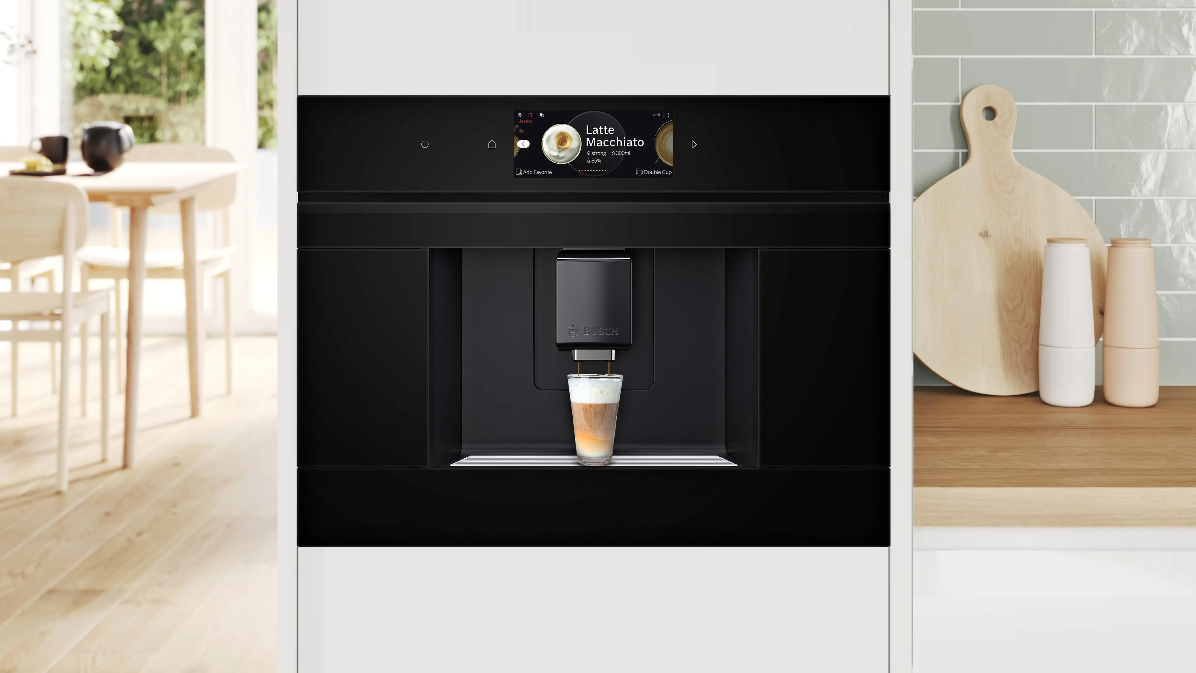 Macchina da caffè incorporata che dispensa caffè in cucina moderna con piano in legno e utensili.