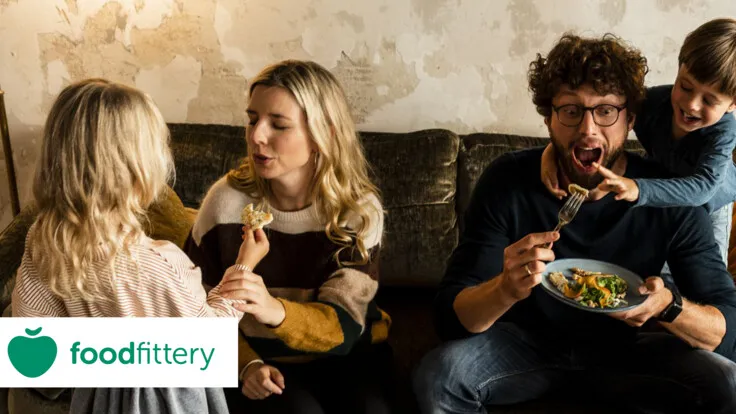 Family eating with foodfittery logo