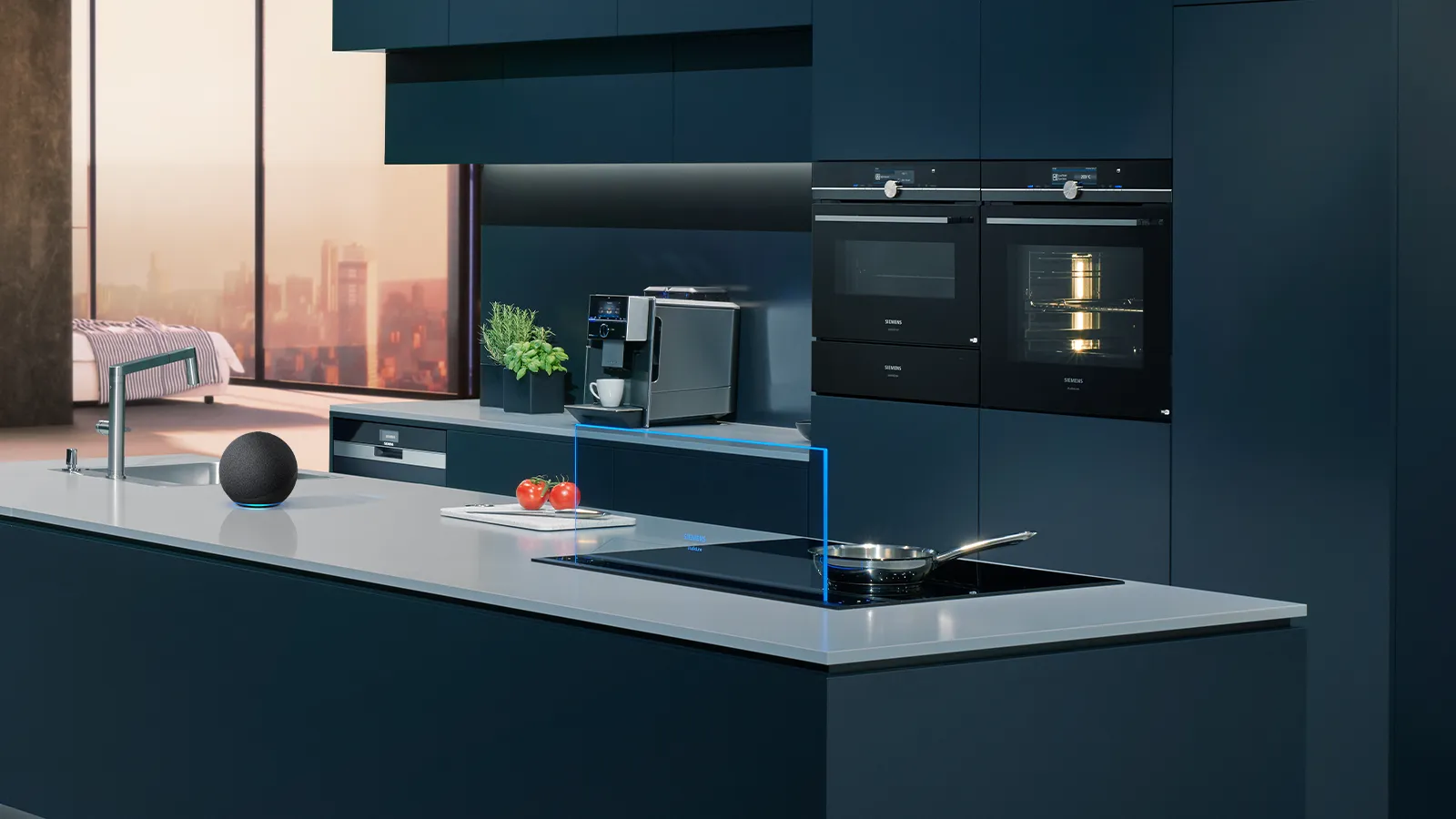 A Siemens kitchen with ovens, glass draft and coffee machine, as well as an amazon echo