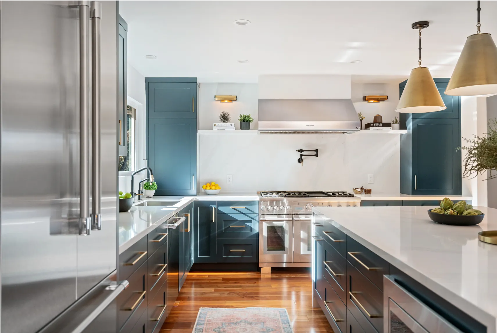 Thermador refrigeration and range blue green stainless steel kitchen