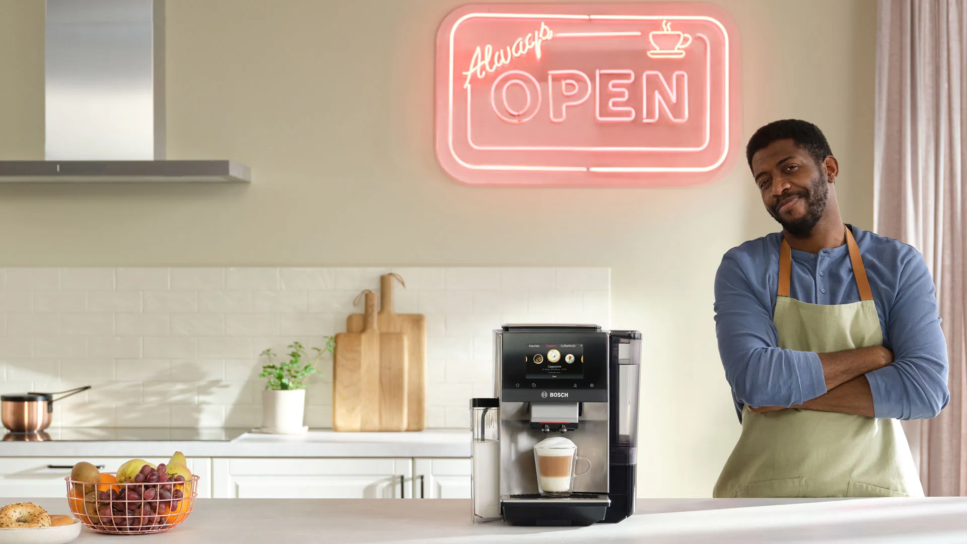 A person in a white karate uniform with a black belt performs a high kick in a bright, minimalist kitchen. Behind them is a sleek coffee machine and various cups, creating a dynamic blend of martial arts and culinary themes.