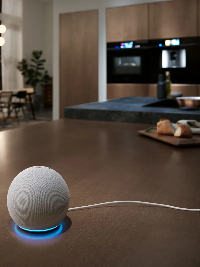 Amazon echo on a table with Siemens ovens in the background