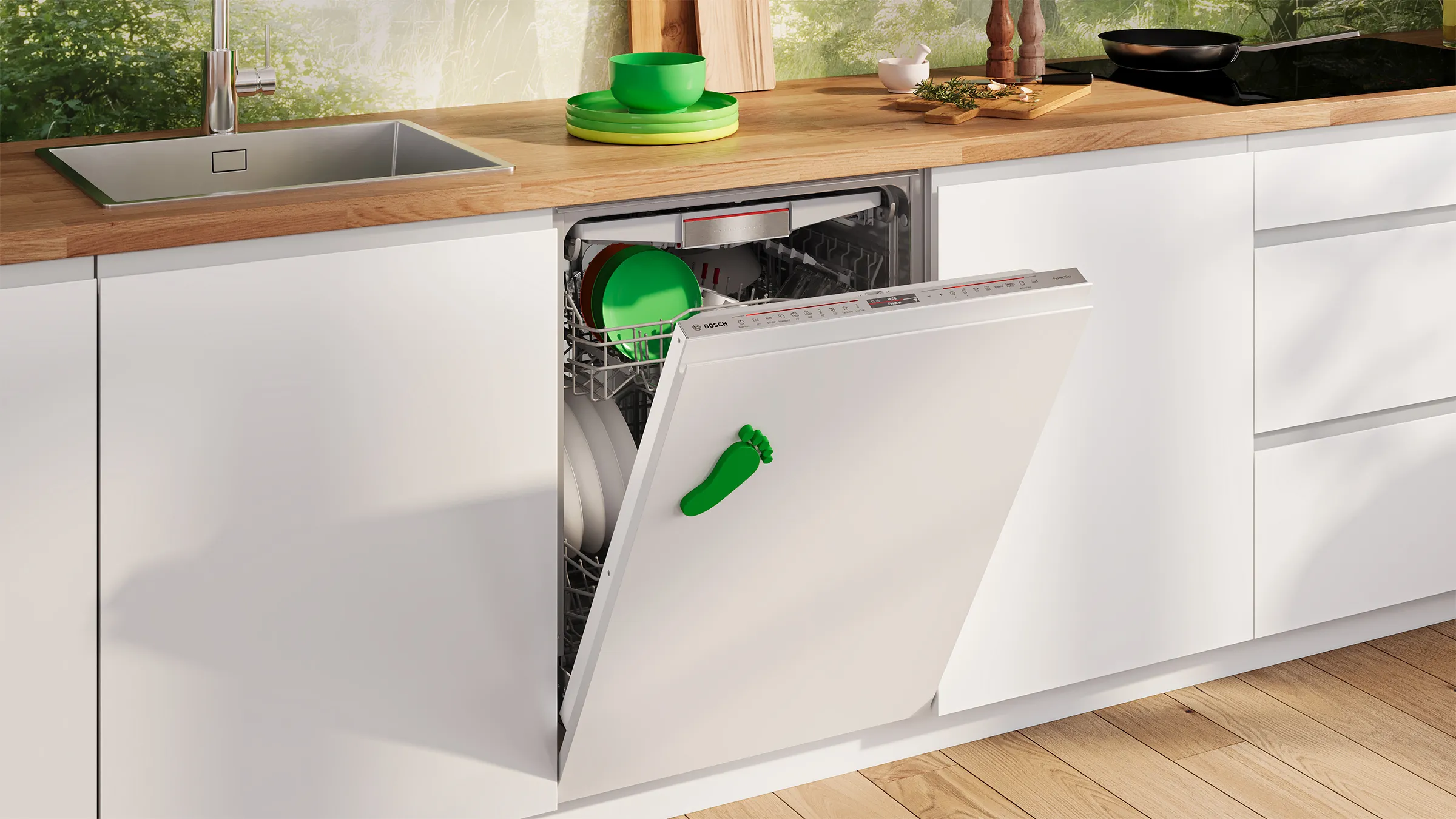 Modern kitchen with open Bosch dishwasher loaded with plates, next to a wooden countertop holding dishes.