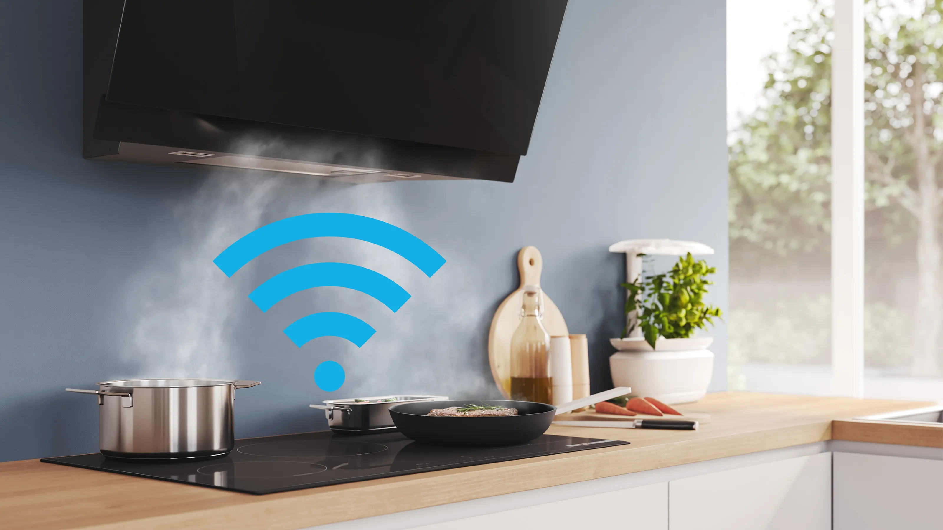 A hob with a frying pan cooking a steak