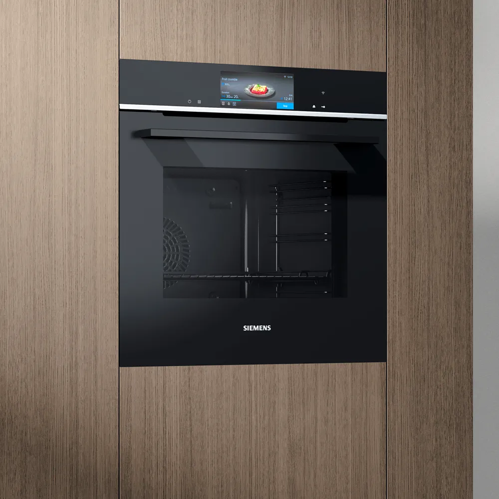 Built in oven in dark wood cabinet