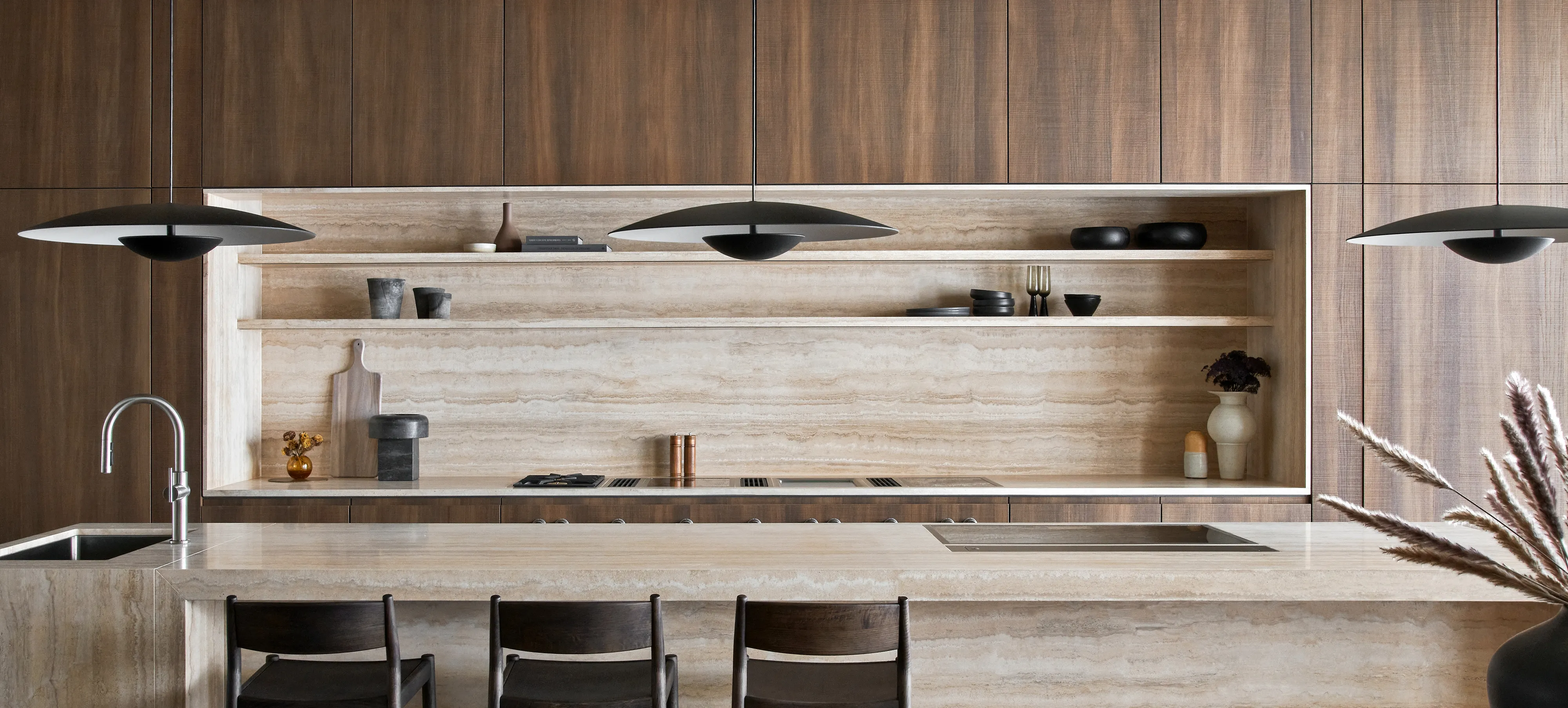 Gaggenau Houston Flagship showroom finished in a solid natural stone and warm brown wood